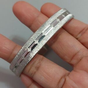 Vintage Monet Brushed Silver Tone Bangle Bracelet Carved Accent Diamond Design